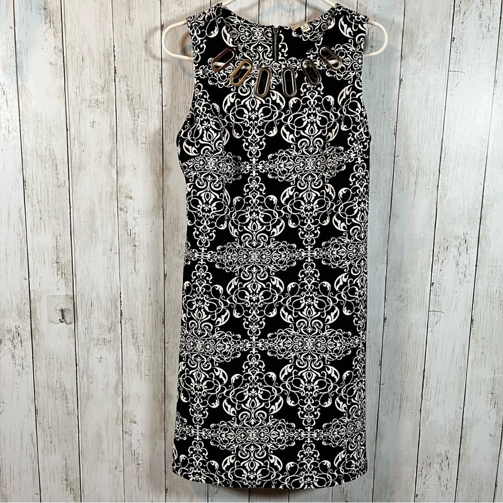 Haani women’s size small black with white decor , sleeveless